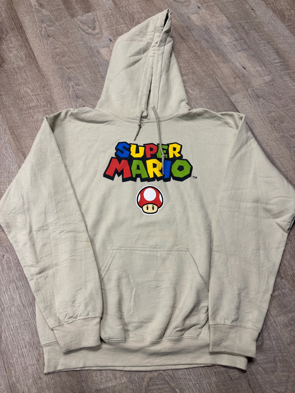 Nintendo Super Mario Beige Hoodie with Multicolor Logo